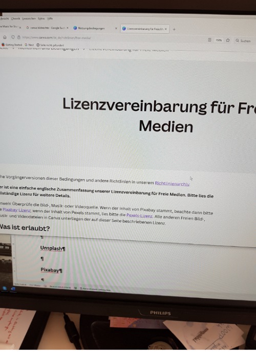 Ein Foto von meinem Computerbildschirm: Im Webbrowser ist die Lizenzvereinbarung von Canva geöffnet. In großen Buchstaben ist "Lizenzvereinbarung für Freie Medien" zu lesen.